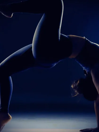 In the quiet of the studio, we find our power. This is a variation of Eka Pada Urdhva Dhanurasana, or One-Legged Wheel Pose, a deep backbend that requires full-body engagement, focus, and a strong connection to the breath.