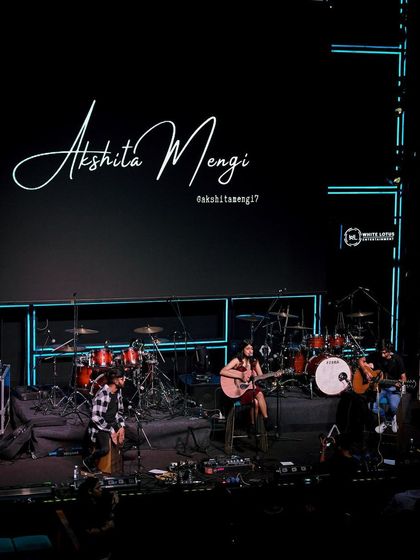 My name on the big screen. A full stage view from a performance where I got to share my music with a fantastic audience.
