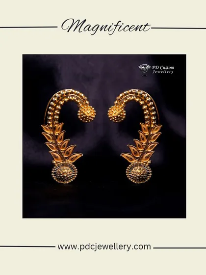 A magnificent pair of traditional gold earrings. The intricate design and craftsmanship make these a stunning piece of heritage jewellery.