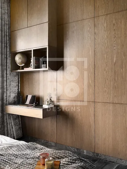 The idea behind this bedroom was to create a place where you could truly feel at home. The integrated wooden wardrobe and floating desk provide functionality without sacrificing style.