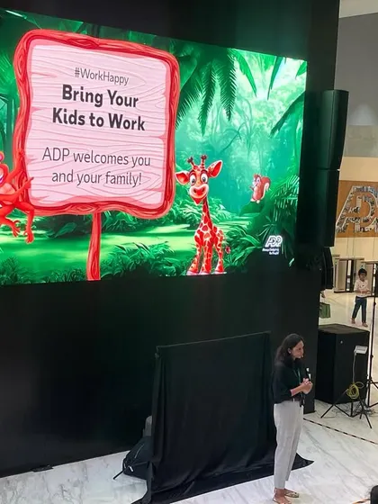Getting ready for a "Bring Your Kids to Work" event for ADP. These events are a fantastic way for companies to engage with their employees and create a family-friendly atmosphere.