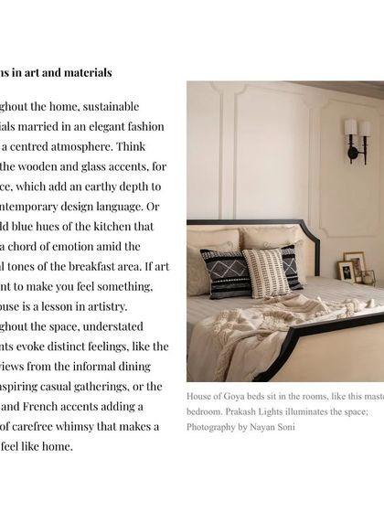 A press clipping of a bedroom from our Riviera Maison project, noting the use of sustainable materials and artful, understated elements.