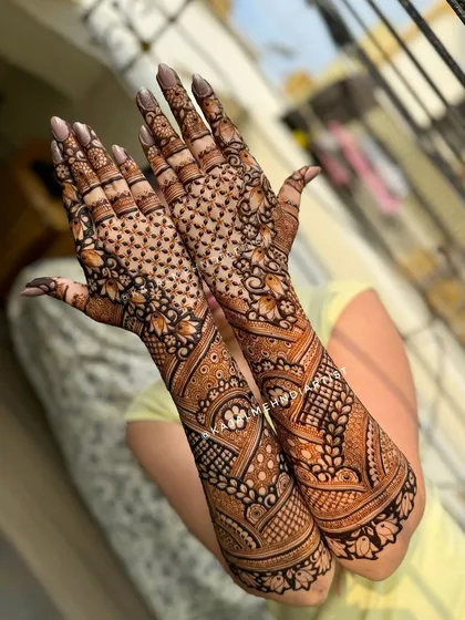 An angled view of the floral backhand design.