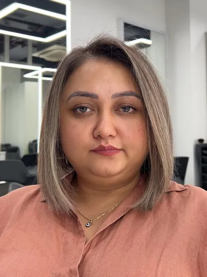 A happy client with her new bob. The style is flattering and easy to manage, perfect for a busy lifestyle.