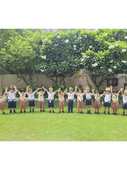 Our young eco-warriors stand together, united in their celebration of Van Mahotsav, raising their hands for a greener planet.