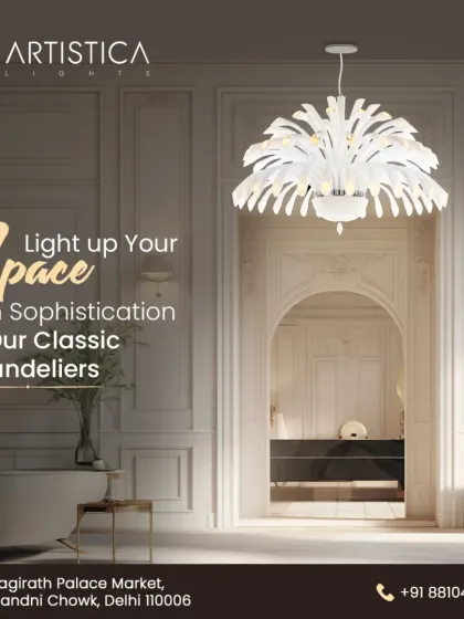 This classic white chandelier features a unique, feather-like design. It brings a touch of softness and sophistication to a room, perfect for a classic entryway or a serene bedroom setting.