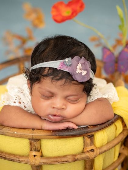 Nestled among the flowers, this little one is sleeping so soundly. I love creating these colorful and vibrant setups.