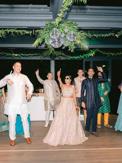 The bride and her international group of friends performing in Italy. Our virtual lessons bring people from different countries together.