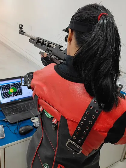 Romila Singh from our Delhi branch takes aim during an inter-branch online match. These virtual competitions allow our shooters from different locations to compete against each other and maintain a competitive edge.