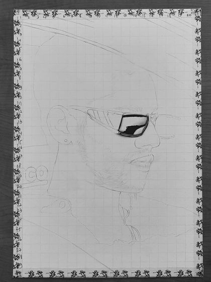 A step-by-step look at my 85-hour portrait of Baseer Ali. You can see the grid lines and how I build up the layers of graphite and charcoal to create a photorealistic effect.