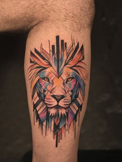 A modern, geometric take on a classic symbol of strength. This lion's head is created with sharp lines and a vibrant, multi-color palette, resulting in a unique and contemporary piece of abstract art.