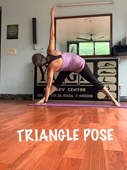 This is the Triangle Pose, or Trikonasana, a great way to stretch the entire side of the body while strengthening the legs and core. We adapt the depth of this pose based on your comfort.