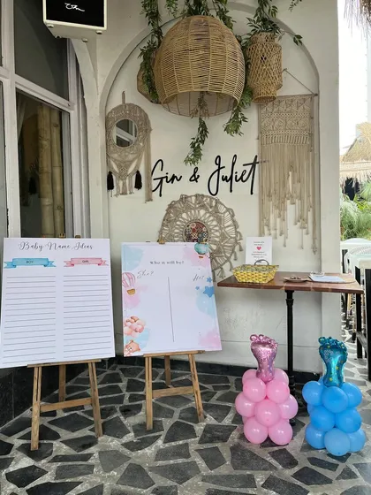 We love incorporating fun activities, like these "Baby Name Ideas" and "Guess the Due Date" boards for a baby shower.