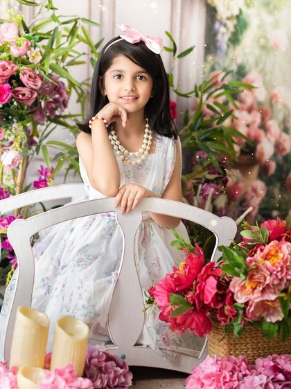 A beautiful portrait of an older sister during a shared sibling photoshoot. I make sure each child gets their moment to shine.