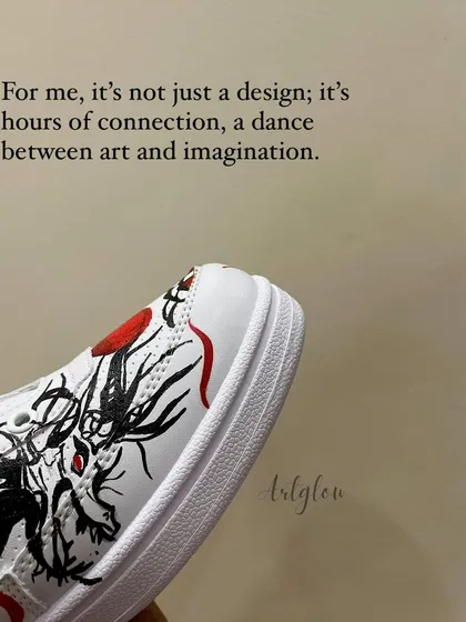For me, it is not just a design. It is hours of connection, a dance between art and imagination. This close-up shows the dragon's face on the custom sneakers.