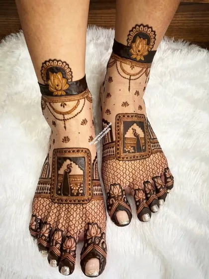 A traditional foot design featuring peacock motifs within squares and a lotus anklet pattern.