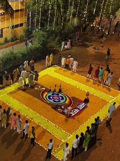 An overhead shot of the entire club family gathered for the Laxmi Pujan ceremony.