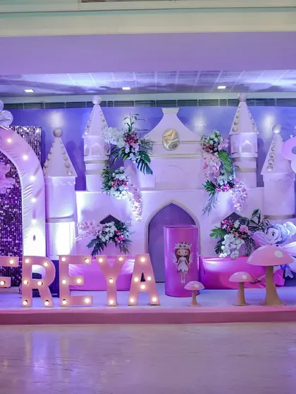 Every detail matters in creating a fairytale. For Freya's 5th birthday, I designed this enchanting Wonderland theme, complete with a custom castle backdrop, whimsical mushroom props, giant butterfly wings, and personalized light-up marquee letters.