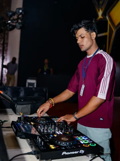 It's all about the craft. Here's a close-up of me at the Pioneer DJ decks, focused on mixing tracks and creating a seamless musical journey for the dance floor.