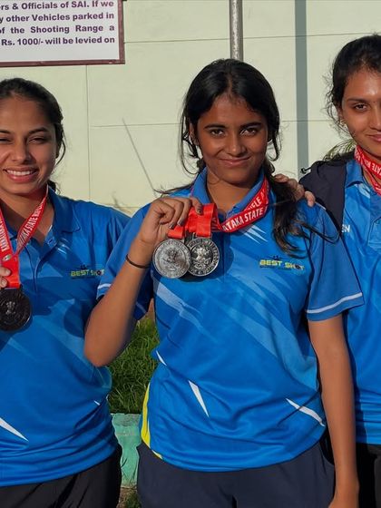 Our outstanding Air Pistol ISSF women's team showing off their medals after a successful performance at the 13th State shooting competition.