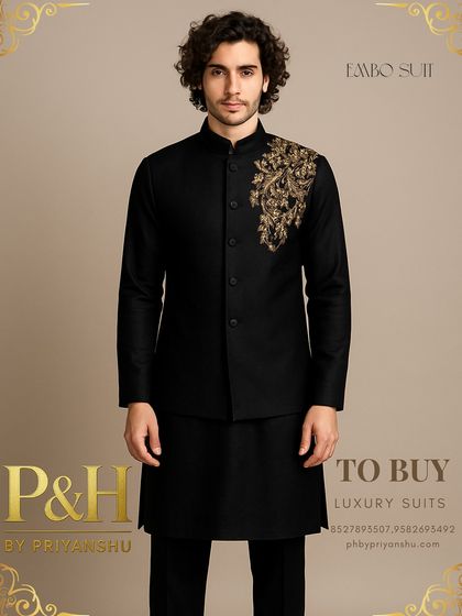 A closer view of the black Nehru jacket set, emphasizing the beautiful contrast between the black fabric and the golden hand-embroidery.