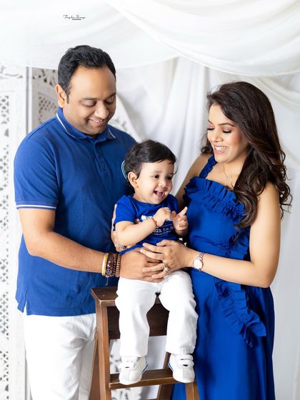 A candid family photo full of laughter. Capturing these genuine moments of joy is my ultimate goal in any family session.