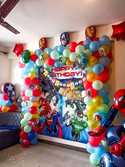 Your little hero's dream party comes to life with our Avengers and superhero theme. This action-packed setup includes a full backdrop of favorite characters, themed balloon columns, and a giant inflatable Spider-Man, creating an immersive world for kids.