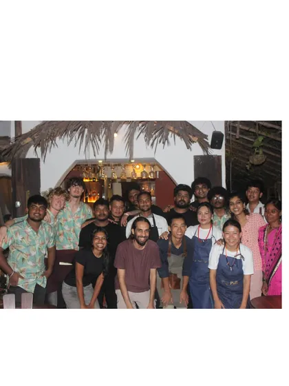 A group photo of our team and the wonderful staff at our Goa pop-up venue. These collaborations and the sense of community are what make events so special.