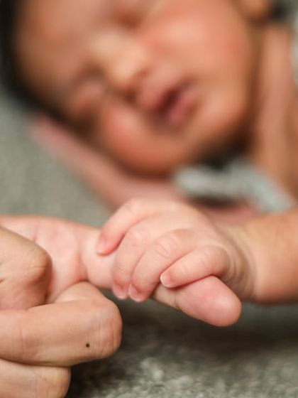 Teeny tiny. A newborn's hand holding on for dear life. It's a powerful reminder of how much they need you. ❤️