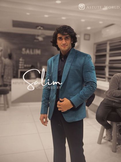 A client in a simple yet elegant teal velvet blazer. Sometimes the richness of the fabric and a perfect cut are all you need to make a statement.