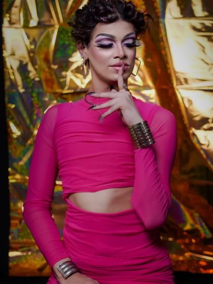 A sassy and confident pose that perfectly captures the spirit of drag.