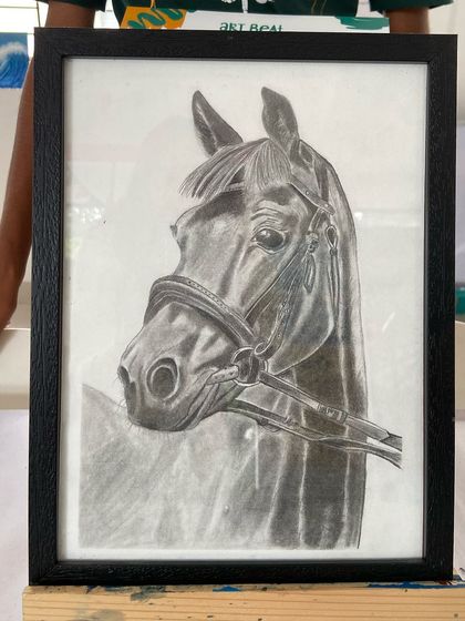 A detailed sketch of a horse, showing the student's mastery of anatomy and shading.