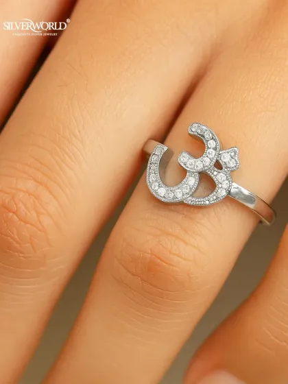 Wear your peace with our handcrafted 925 sterling silver Om ring. The sacred symbol is delicately studded with high-grade Zirconia, making it a sparkling daily reminder of balance and inner strength.