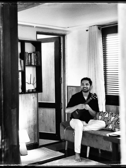 Divyam, playing his ukulele at home. Capturing people with the things they love always results in the most authentic portraits.