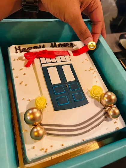 A "Happy Home" cake to celebrate a housewarming, designed to look like the front door of a new home.