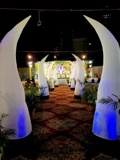 I offer these inflatable Elephant Tusk pillars for rent to create a unique and majestic entryway. They are illuminated from within and guide the path to the main event area.