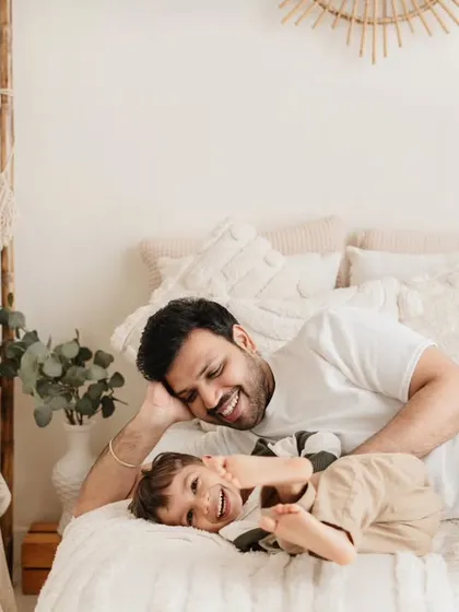 A candid moment of play between father and son. These relaxed, lifestyle shots truly capture the personality of your family.