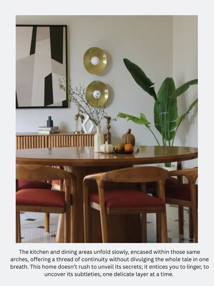 Another view of the dining space, showcasing the round table that encourages conversation. The design unfolds slowly, enticing you to linger and appreciate the subtle details.