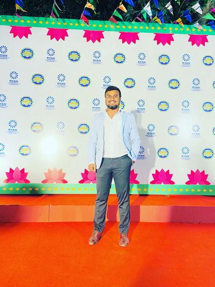 Posing on the red carpet at the Ryan Festival. I take pride in being a part of such well organized and grand school events.