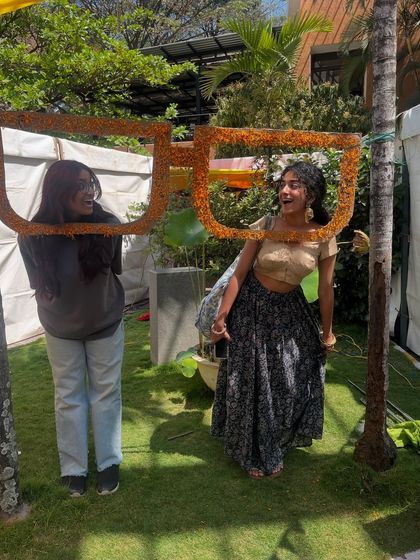 Fun and laughter at our photo booth. These oversized floral glasses were a huge hit, bringing out the playful side of our visitors.