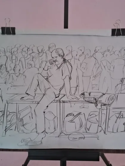 A completed live sketch from Bhubaneswar, Odisha, displayed on an easel. This piece captures a complex scene of public life, with multiple figures interacting in a shared space, drawn entirely on location.