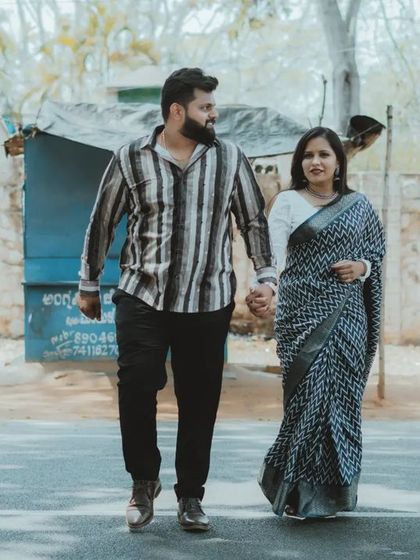 A candid walking shot of a couple on the street. This lifestyle approach to pre-wedding photography captures a slice of your life together.