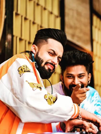 Sharing a moment with a fellow DJ at Badmaash Lounge. The camaraderie behind the decks is just as important as the music.