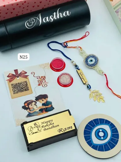 A complete Rakhi hamper featuring an evil eye theme. It comes with a Bhai rakhi, a Bhabhi lumba, a personalized wooden rakhi box, a custom name bottle, and other essentials.