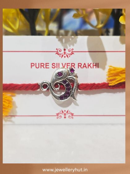 Another beautiful Ganesha Rakhi design, this one adorned with sparkling purple stones for a touch of color.