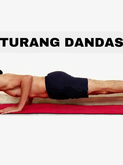 Chaturanga Dandasana, or Four-Limbed Staff Pose. This pose is key for building upper body and core strength, essential for vinyasa flows.