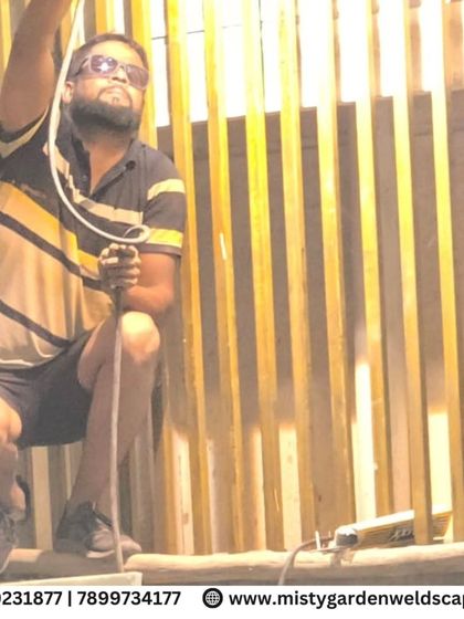 A team member at work on the safety grill, demonstrating the hands-on approach I take with every project. This attention to detail ensures the highest quality results.
