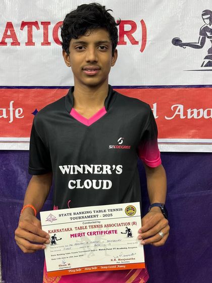 Abhinav K Murthy with his merit certificate after winning the season's first Karnataka state ranking Under 19 Boys singles title.