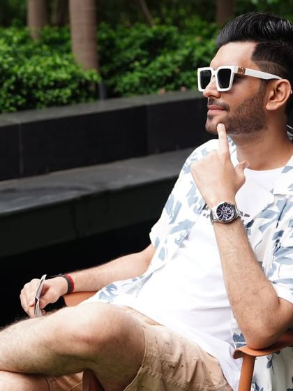 A moment of thought while preparing my script. Even in a casual setting, the preparation is always meticulous.