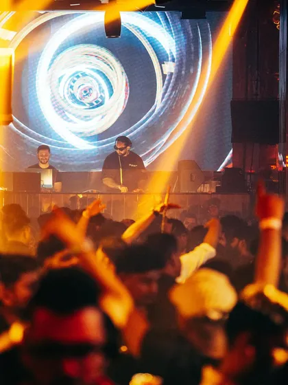 A view from the console as the crowd goes wild. The combination of great music, dynamic visuals, and an engaged audience is what I aim for at every event.